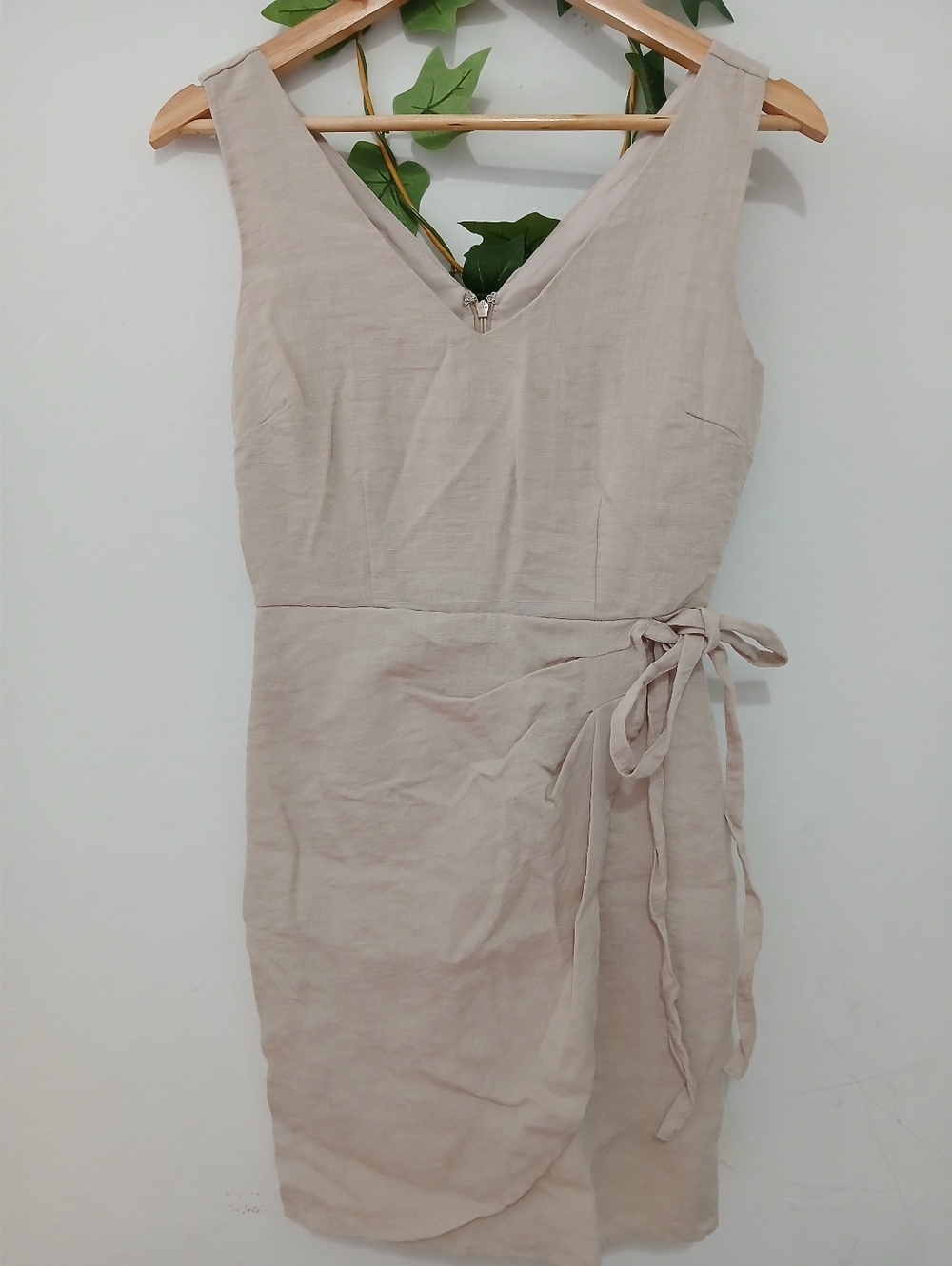 Sam Edelman beige dress with a bow detail at the waist.